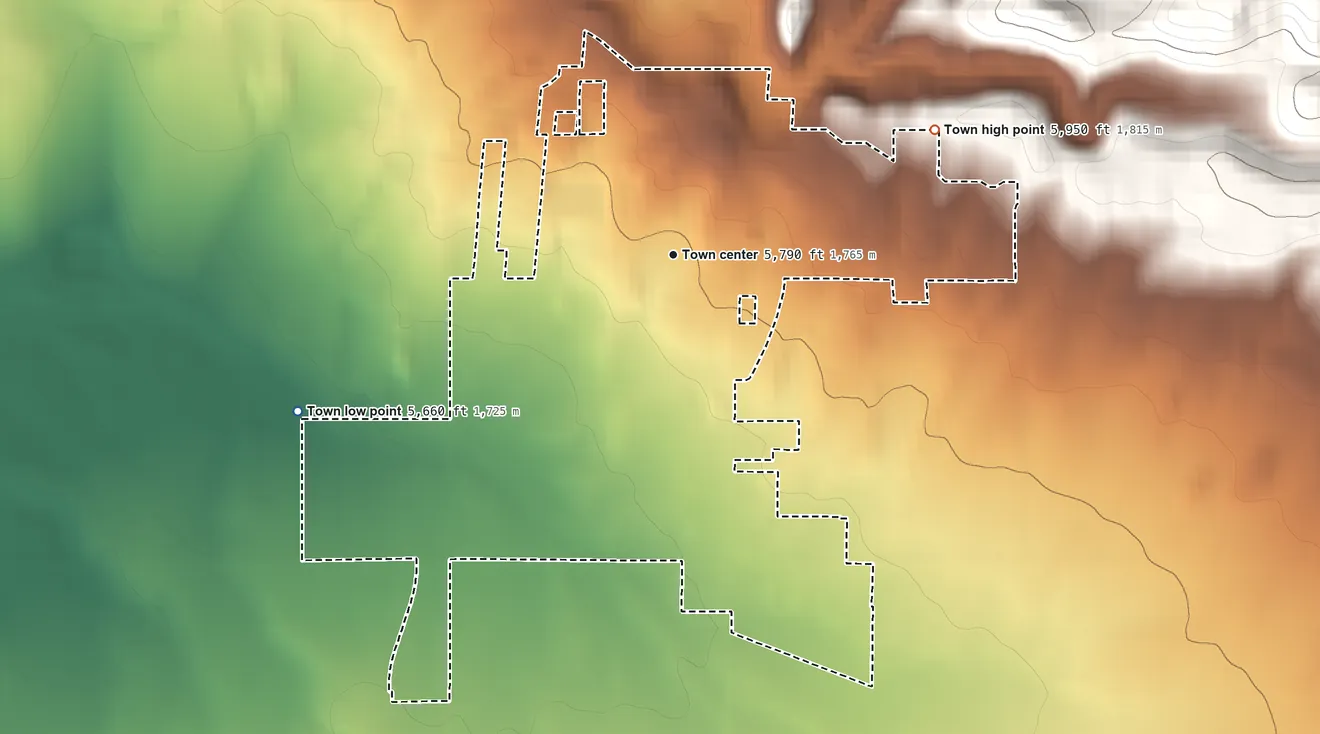 Topographic elevation map of Nucla, Colorado, shaded from 5,660 ft on the southwest side to 5,950 ft on the northeast edge, below higher ground just outside