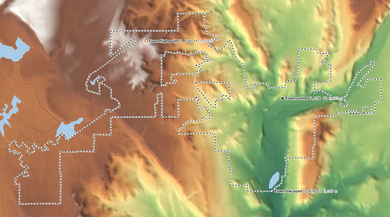 Topographic elevation map of Pagosa Springs, Colorado, shaded from 7,020 ft on the south side to 7,720 ft on the northwest side