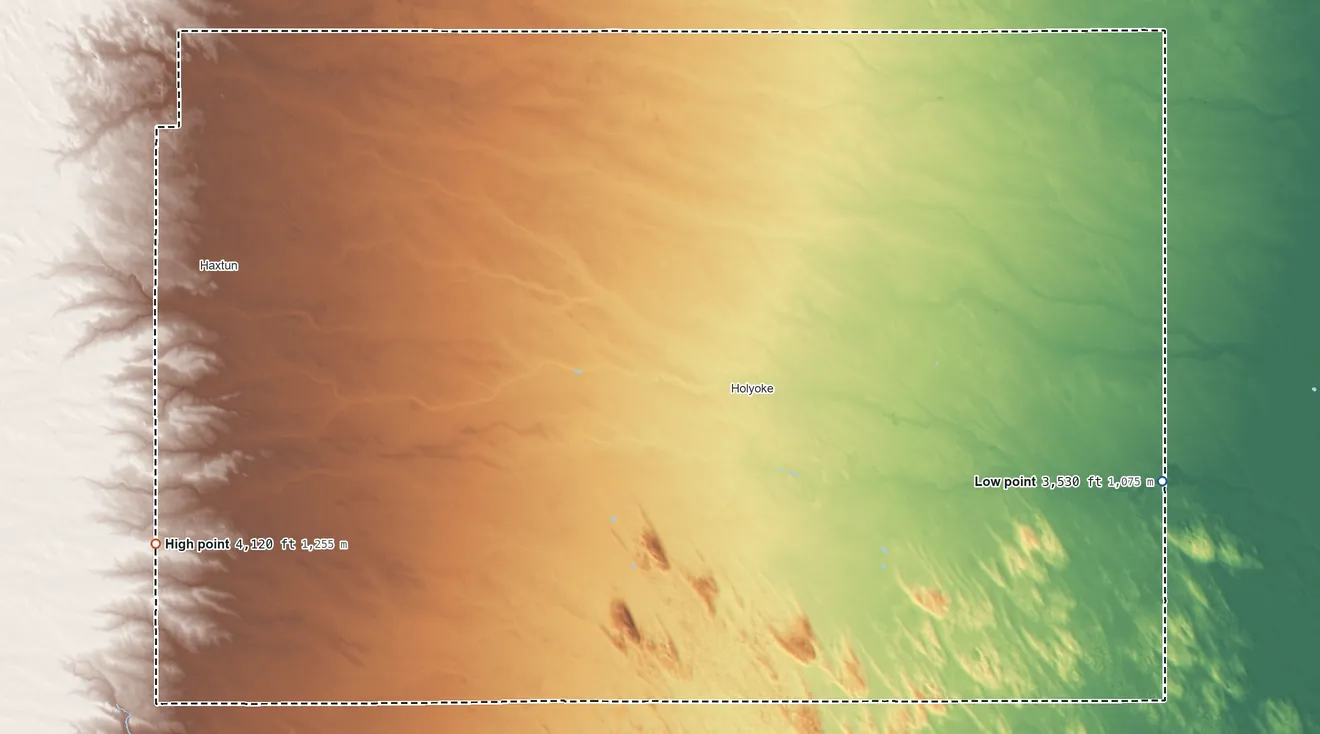 Topographic elevation map of Phillips County, Colorado, shaded from 3,530 ft on the east side to 4,120 ft on the west side