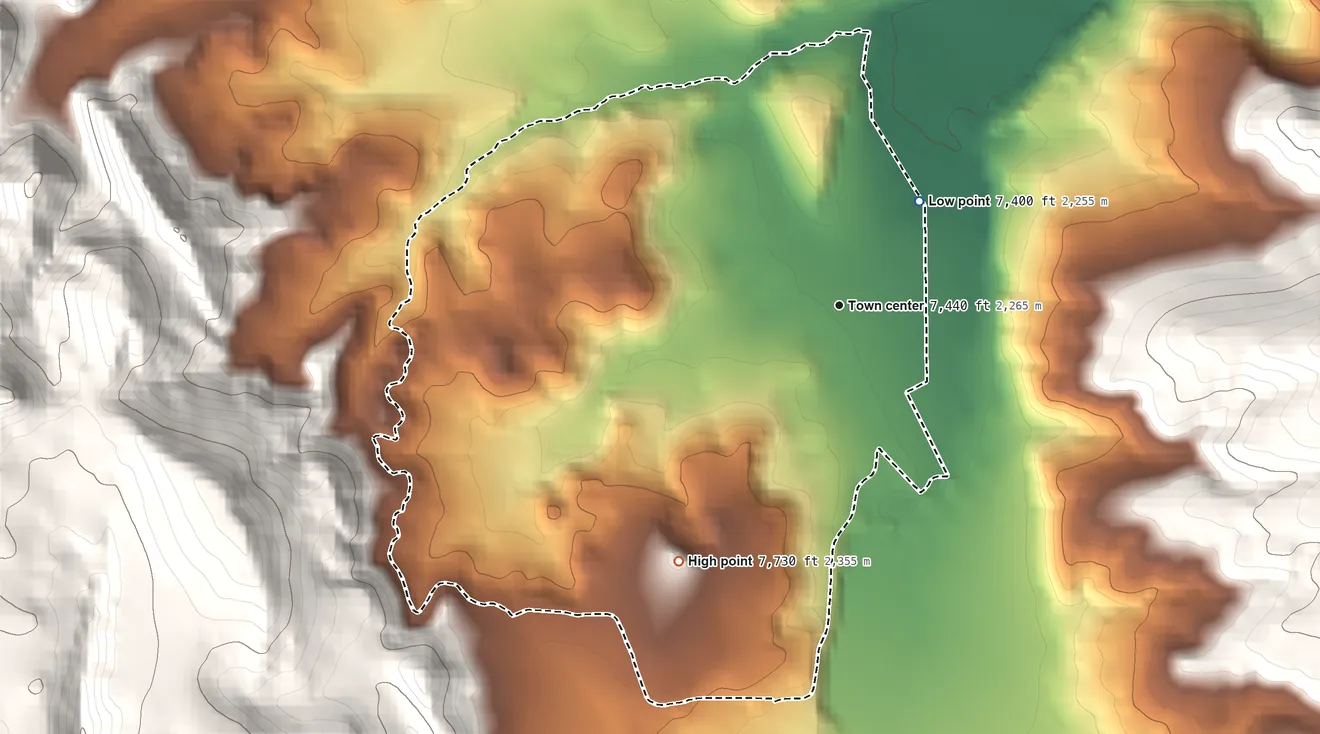Topographic elevation map of Phippsburg, Colorado, shaded from 7,400 ft on the northeast side to 7,730 ft on the southwest edge, below higher ground just outside