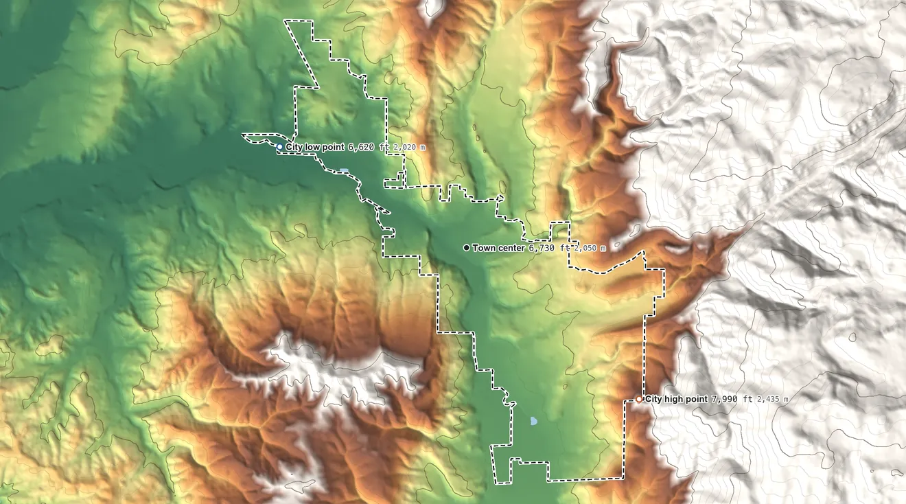 Topographic elevation map of Steamboat Springs, Colorado, shaded from 6,620 ft on the northwest side to 7,990 ft on the southeast edge, below higher ground just outside