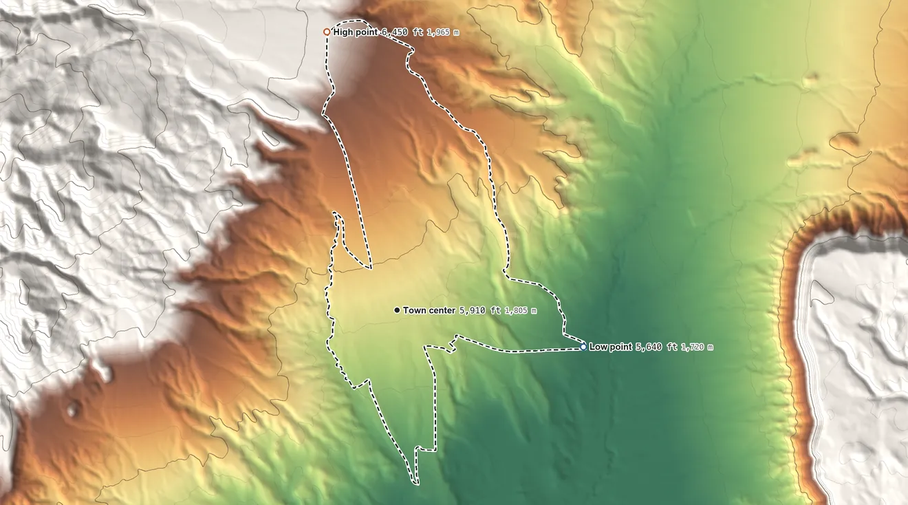 Topographic elevation map of Towaoc, Colorado, shaded from 5,640 ft on the east side to 6,450 ft on the north edge, below higher ground just outside