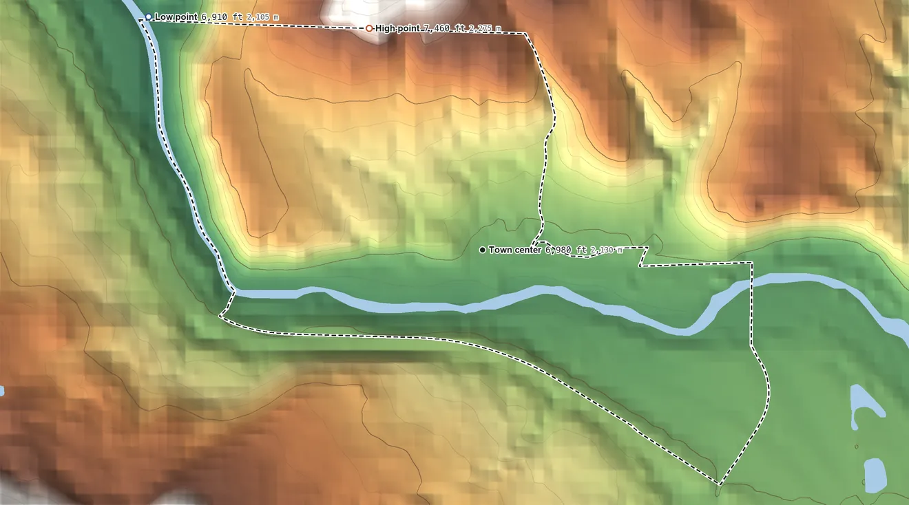 Topographic elevation map of Wolcott, Colorado, shaded from 6,910 ft on the northwest side to 7,460 ft on the northwest edge, below higher ground just outside