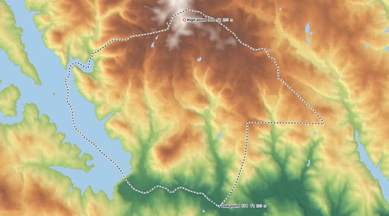 Topographic elevation map of Heron Bay, Georgia, shaded from 670 ft on the south side to 900 ft on the north side