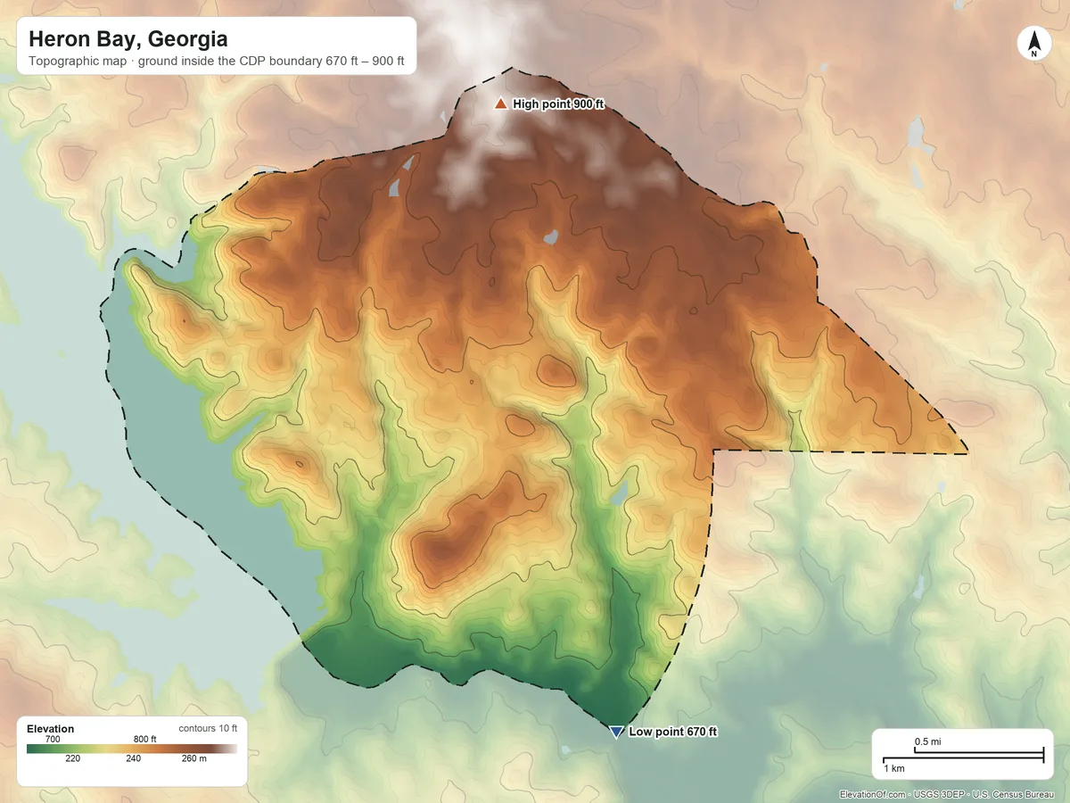 Topographic elevation map of Heron Bay, Georgia, shaded from 670 ft on the south side to 900 ft on the north side