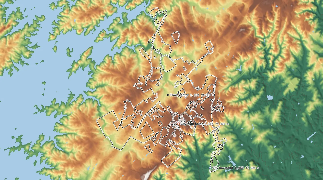 Topographic elevation map of Oakwood, Georgia, shaded from 1,060 ft on the southeast side to 1,310 ft on the south side