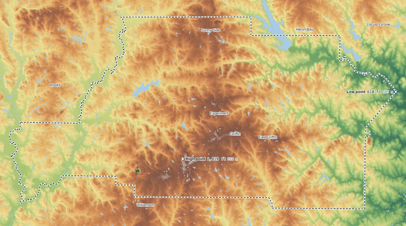 Topographic elevation map of Spalding County, Georgia, shaded from 610 ft on the east side to 1,020 ft on the southwest side