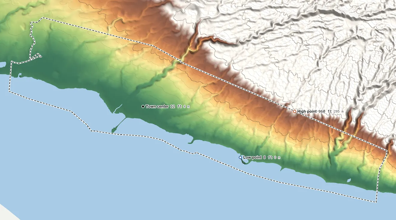 Topographic elevation map of Kaunakakai, Hawaii, shaded from sea level level on the Pacific Ocean to 960 ft on the east edge, below higher ground just outside