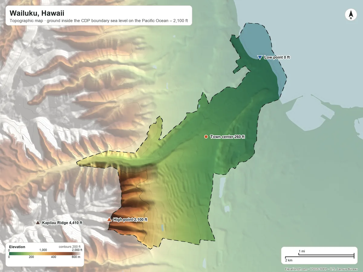 Topographic elevation map of Wailuku, Hawaii, shaded from sea level level on the Pacific Ocean to 2,100 ft on the southwest edge, below higher ground just outside