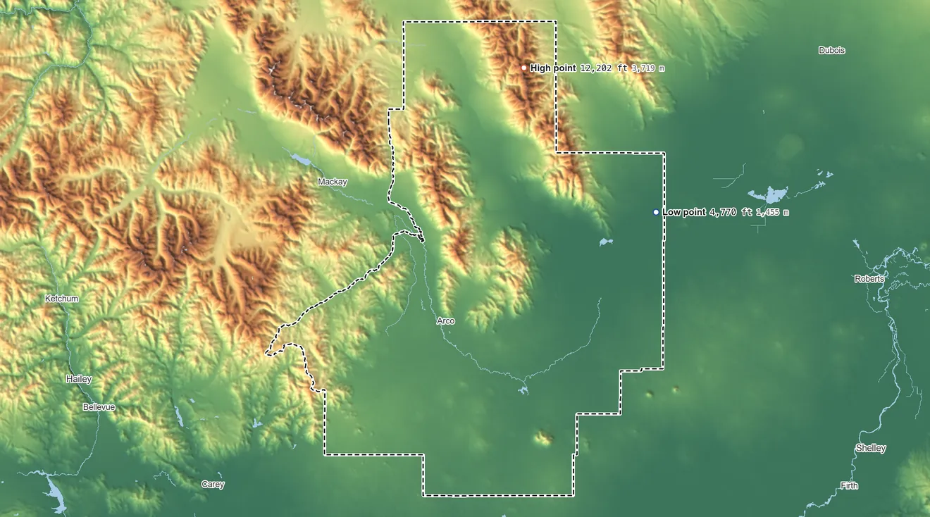 Topographic elevation map of Butte County, Idaho, shaded from 4,770 ft on the east side to 12,202 ft on Diamond Peak
