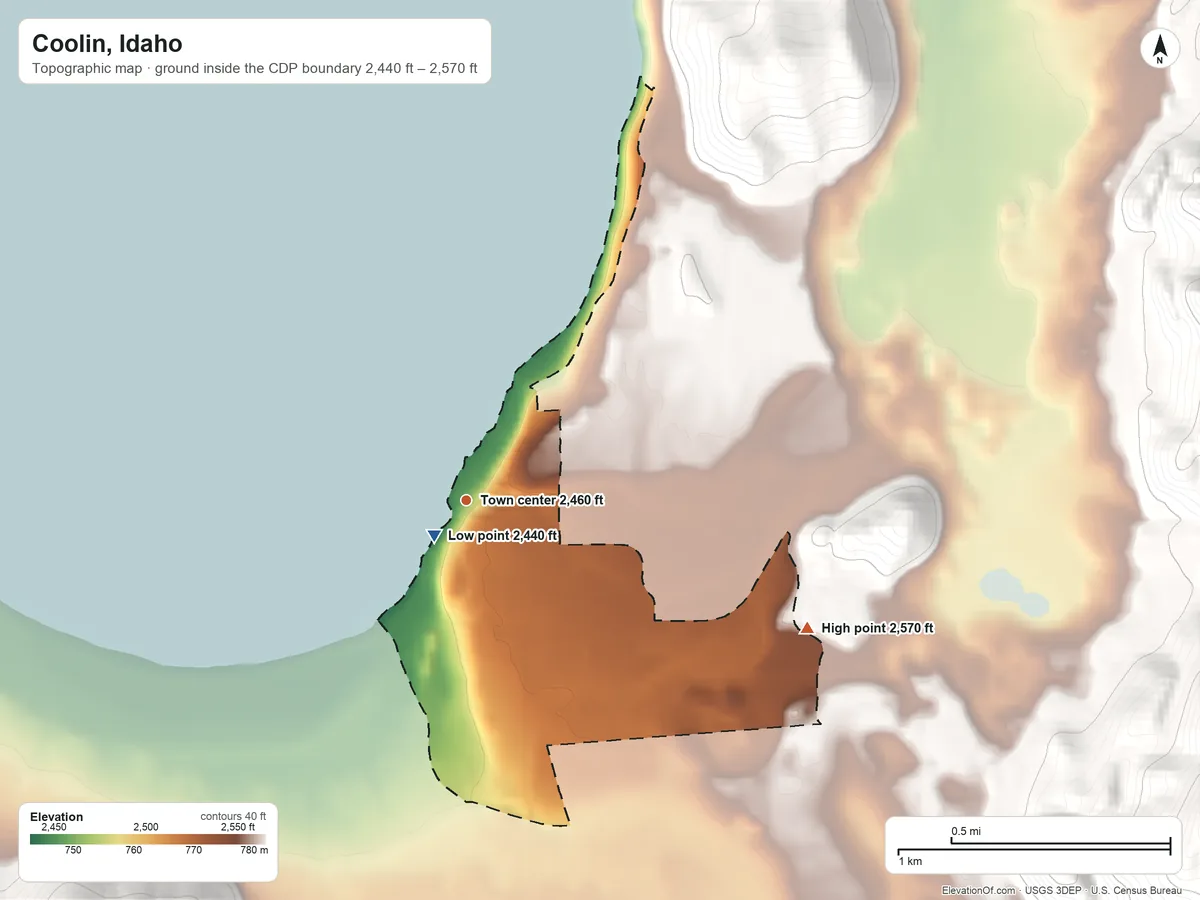 Topographic elevation map of Coolin, Idaho, shaded from 2,440 ft near the middle to 2,570 ft at the foot of the Selkirk Mountains