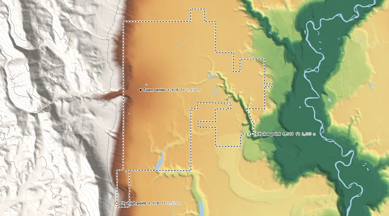 Topographic elevation map of Dayton, Idaho, shaded from 4,540 ft on the east side to 4,970 ft at the foot of the Malad Range