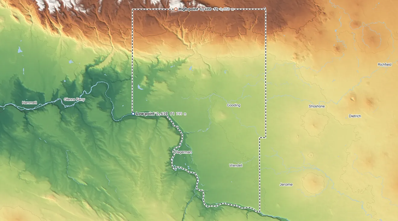 Topographic elevation map of Gooding County, Idaho, shaded from 2,610 ft on the west side to 6,400 ft on the north side