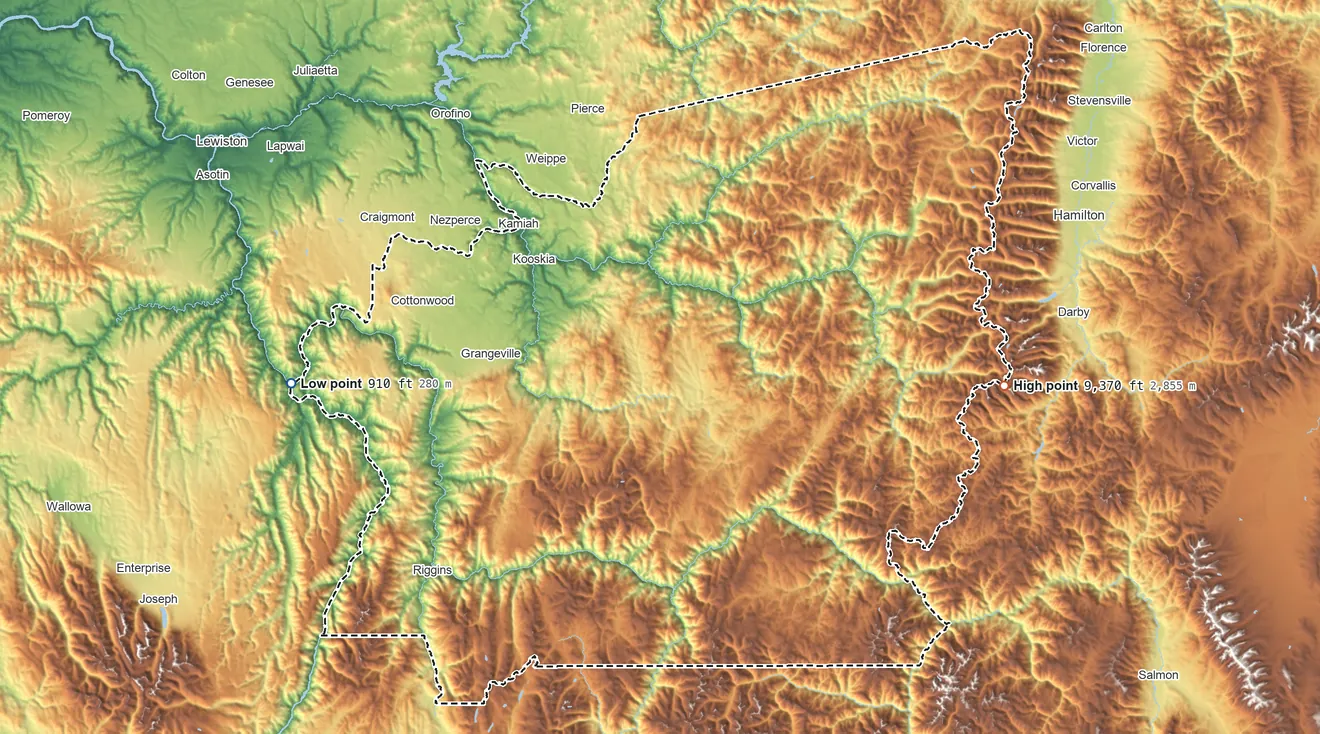 Topographic elevation map of Idaho County, Idaho, shaded from 910 ft on the west side to 9,370 ft on the east side