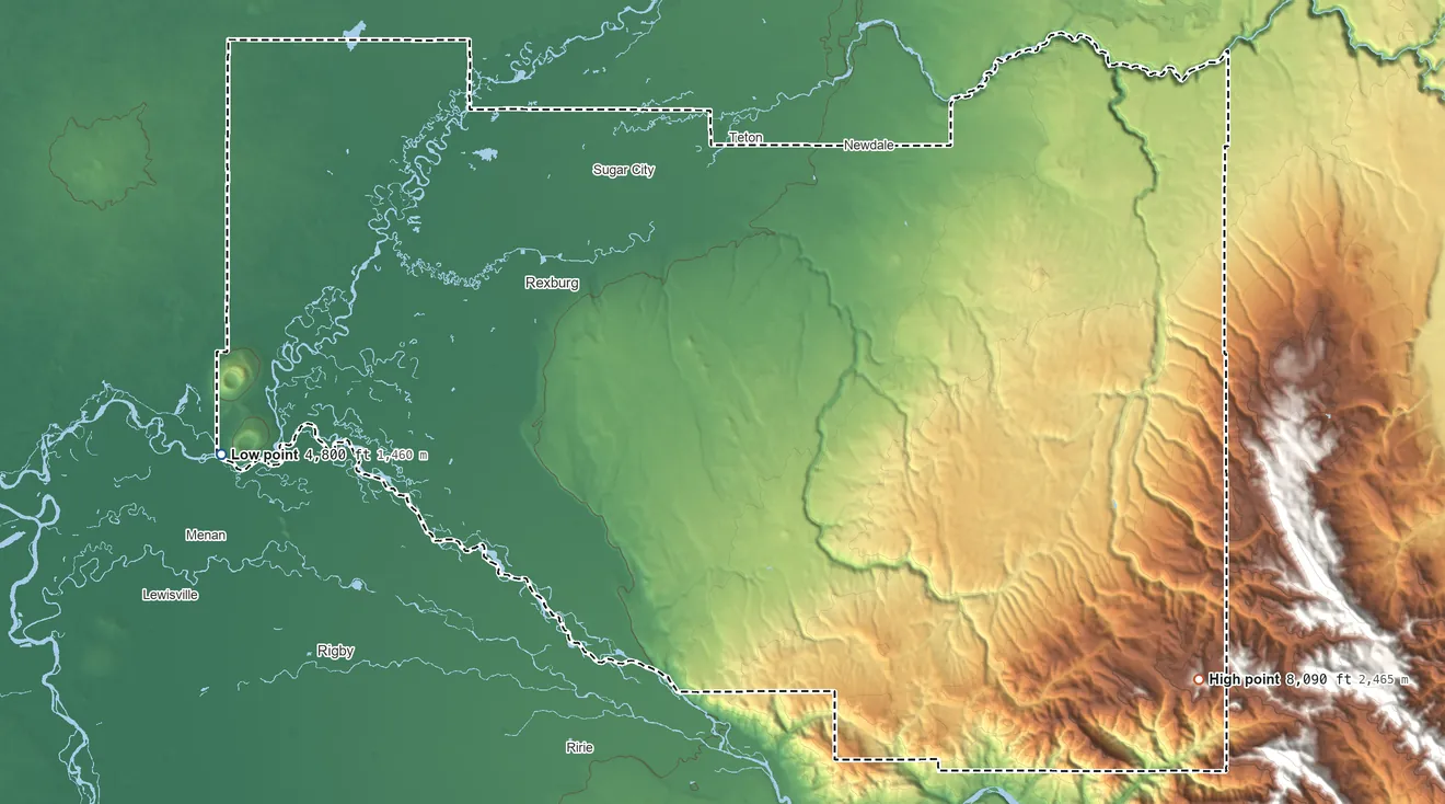 Topographic elevation map of Madison County, Idaho, shaded from 4,800 ft on the west side to 8,090 ft on Red Butte