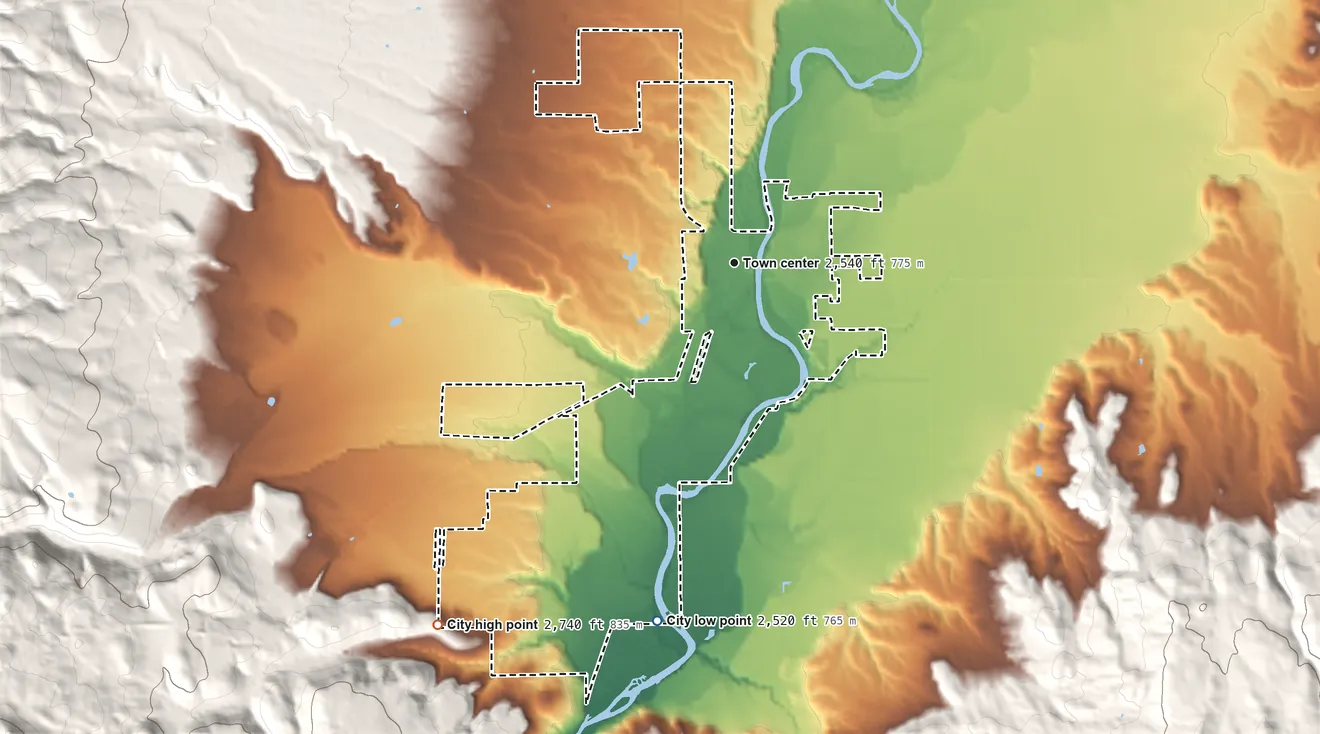 Topographic elevation map of Midvale, Idaho, shaded from 2,520 ft on the south side to 2,740 ft at the foot of the Hitt Mountains
