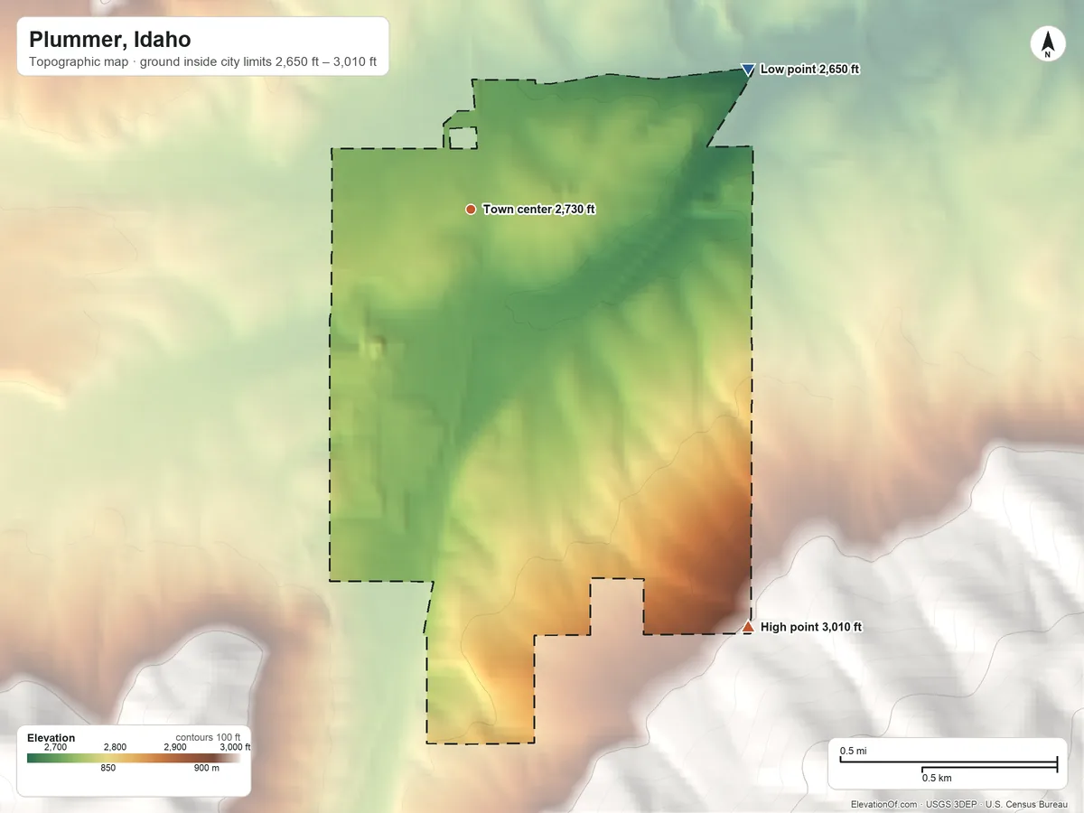 Topographic elevation map of Plummer, Idaho, shaded from 2,650 ft on the northeast side to 3,010 ft on the southeast edge, below higher ground just outside