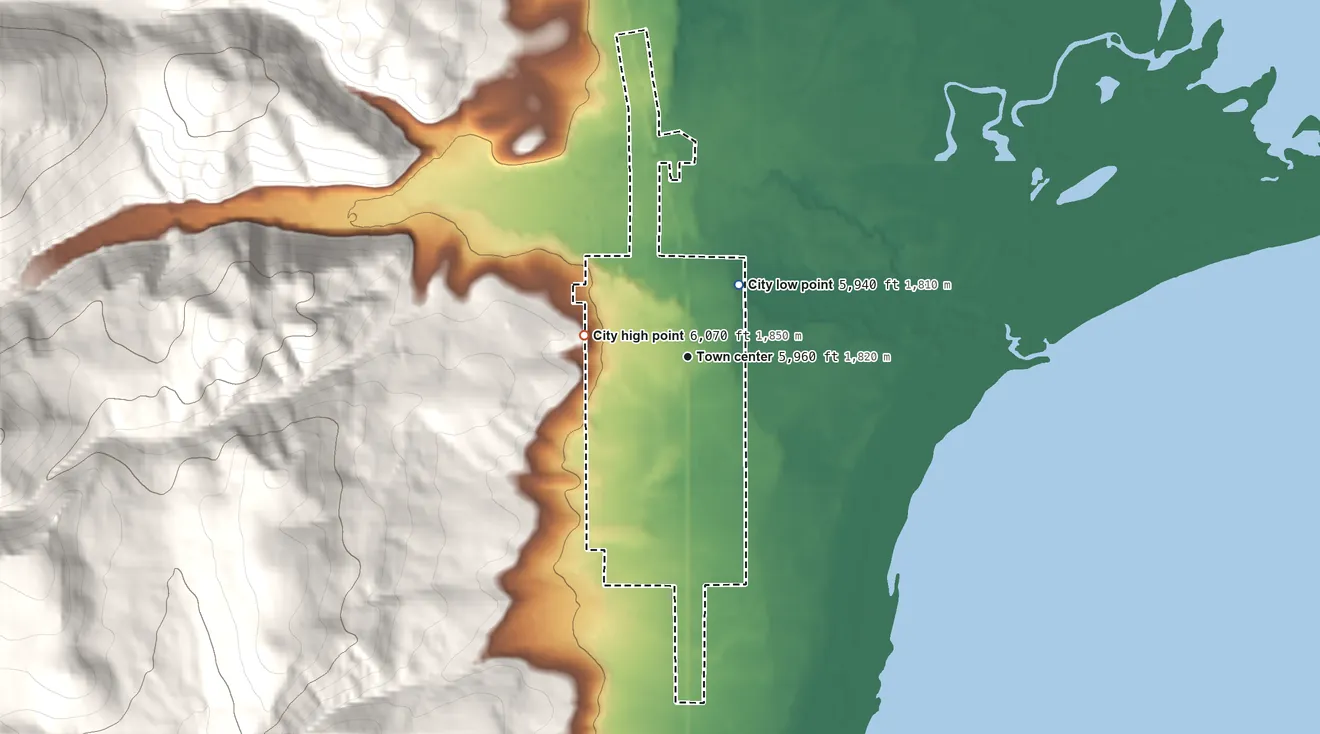 Topographic elevation map of St. Charles, Idaho, shaded from 5,940 ft on the northeast side to 6,070 ft on the west edge, below higher ground just outside