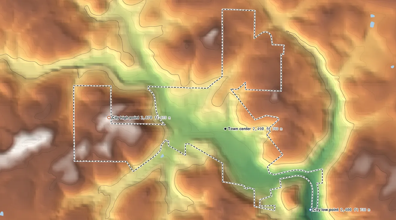 Topographic elevation map of Troy, Idaho, shaded from 2,400 ft on the southeast side to 2,870 ft on the west side