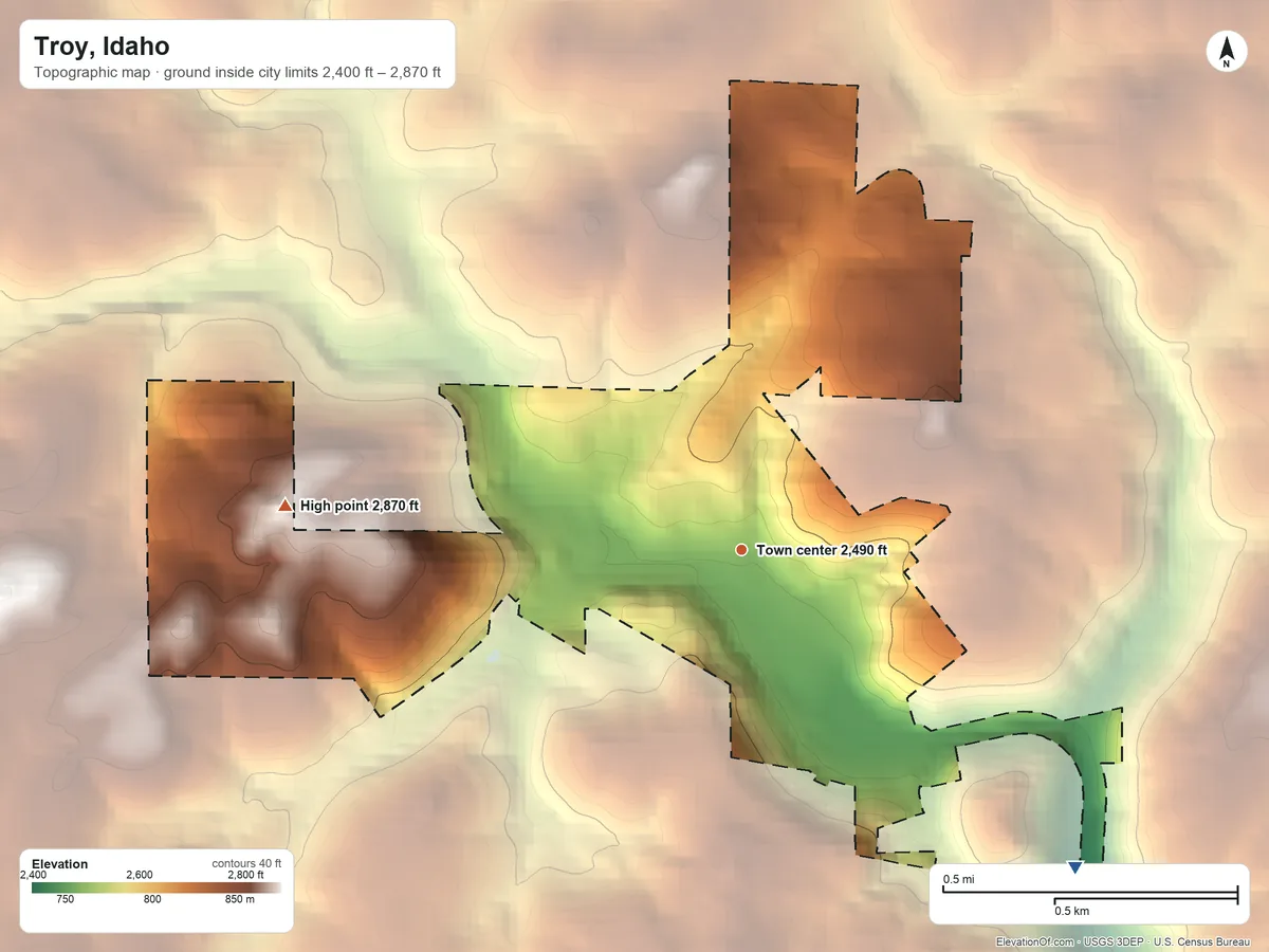 Topographic elevation map of Troy, Idaho, shaded from 2,400 ft on the southeast side to 2,870 ft on the west side
