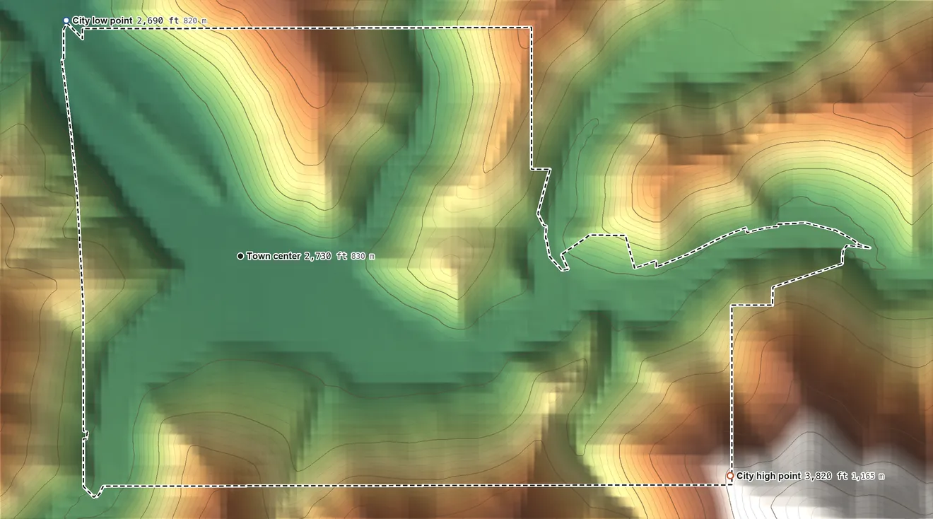 Topographic elevation map of Wallace, Idaho, shaded from 2,690 ft on the northwest side to 3,820 ft at the foot of the St. Joe Mountains