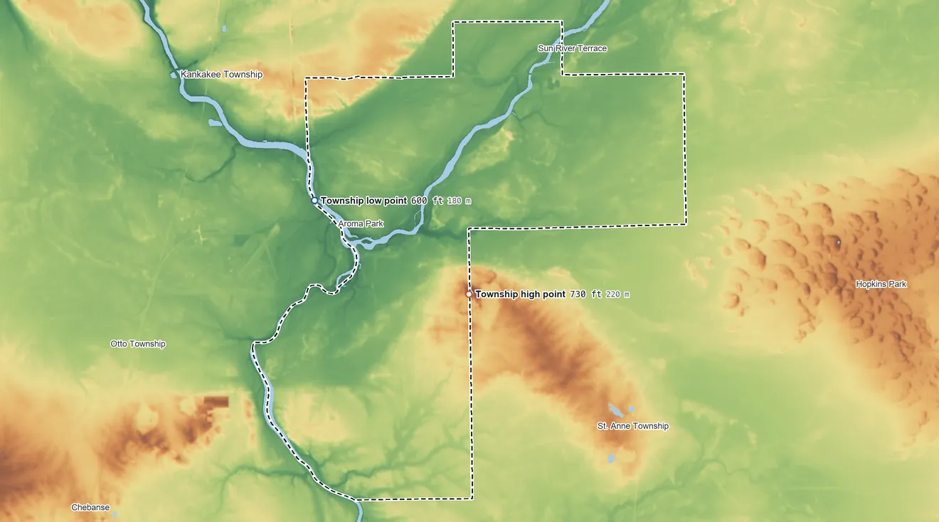 Topographic elevation map of Aroma Township, Illinois, shaded from 600 ft on the west side to 730 ft on Mount Langham