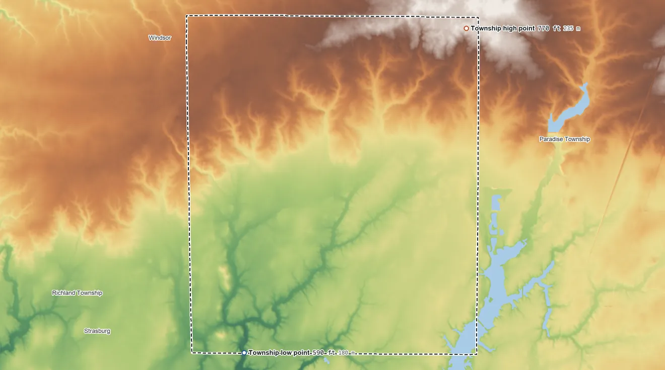 Topographic elevation map of Ash Grove Township, Shelby County, Illinois, shaded from 590 ft on the southwest side to 770 ft on the northeast side
