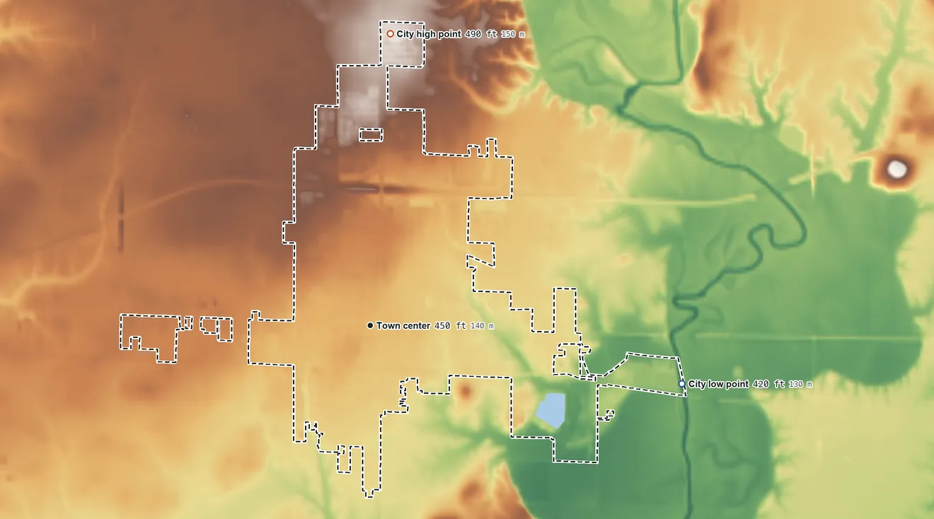 Topographic elevation map of Breese, Illinois, shaded from 420 ft on the east side to 490 ft on the north side