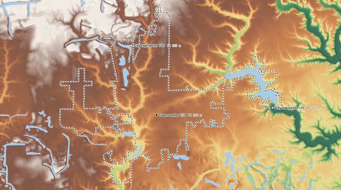 Topographic elevation map of Canton, Illinois, shaded from 540 ft on the east side to 700 ft on the north side