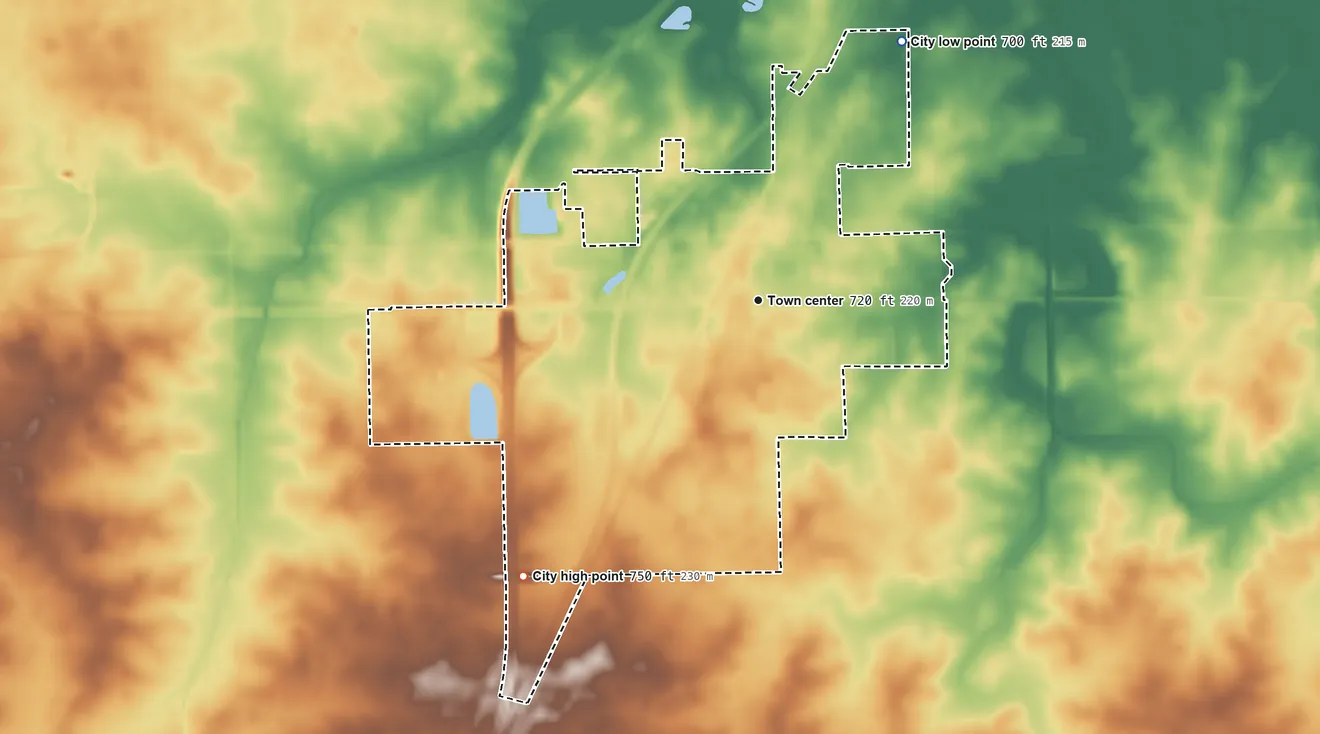 Topographic elevation map of Chenoa, Illinois, shaded from 700 ft on the northeast side to 750 ft on the southwest side