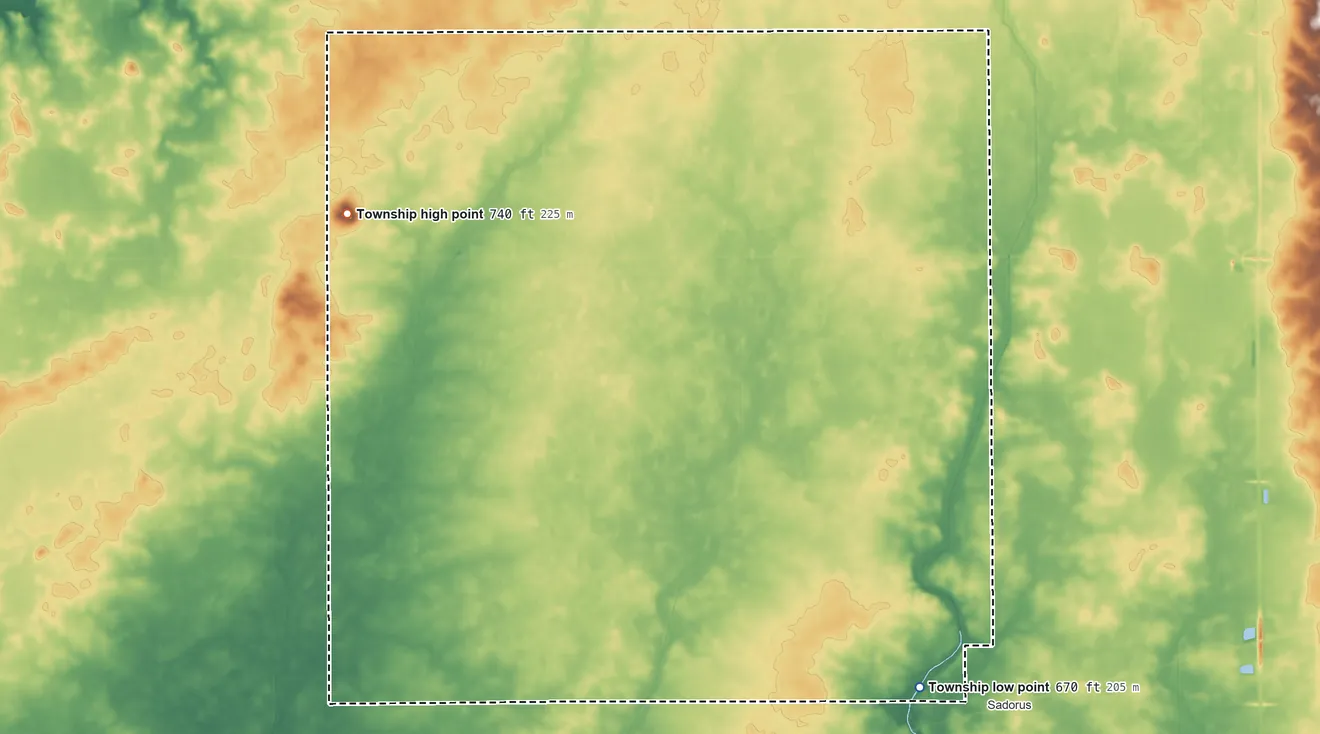 Topographic elevation map of Colfax Township, Illinois, shaded from 670 ft on the southeast side to 740 ft on Blue Mound