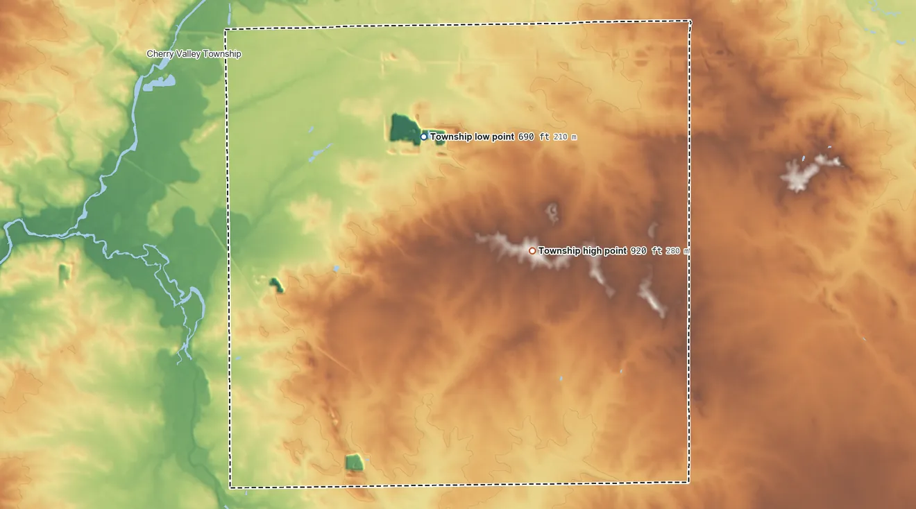 Topographic elevation map of Flora Township, Illinois, shaded from 690 ft on the west side to 920 ft on the south side