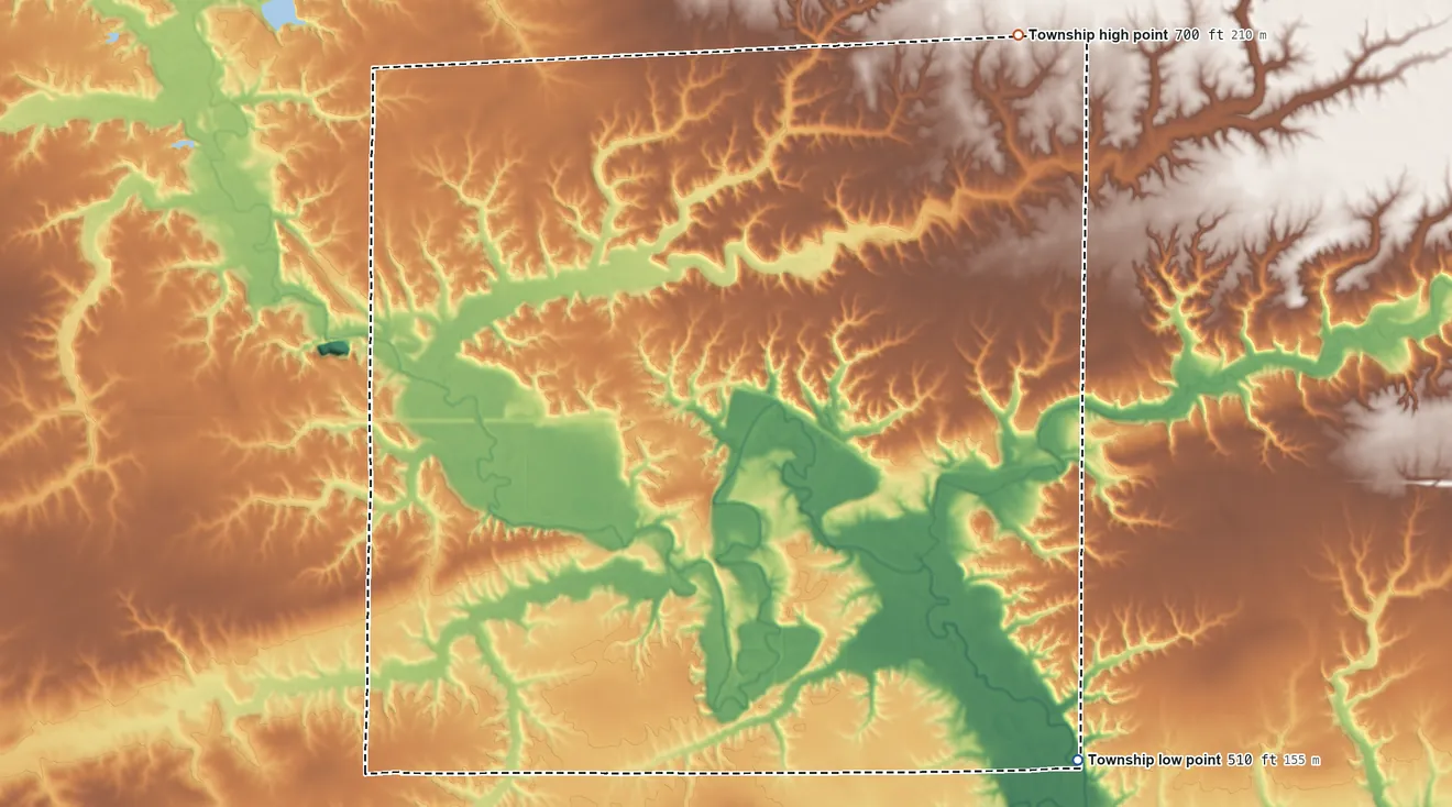 Topographic elevation map of Hancock Township, Illinois, shaded from 510 ft on the southeast side to 700 ft on the northeast side