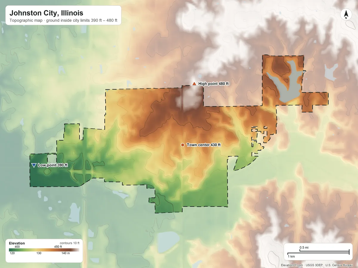 Topographic elevation map of Johnston City, Illinois, shaded from 390 ft on the west side to 480 ft on the north side