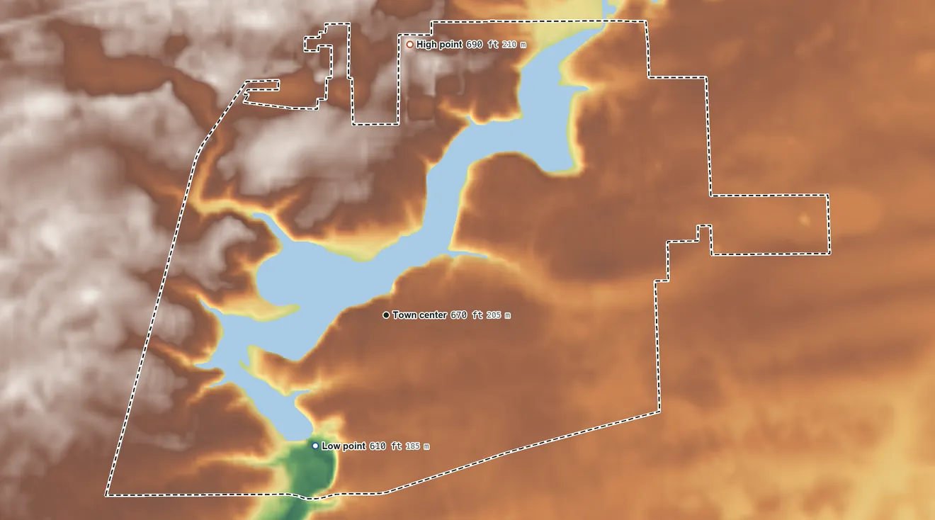 Topographic elevation map of Lake Holiday, Illinois, shaded from 610 ft on the southwest side to 690 ft on the north side