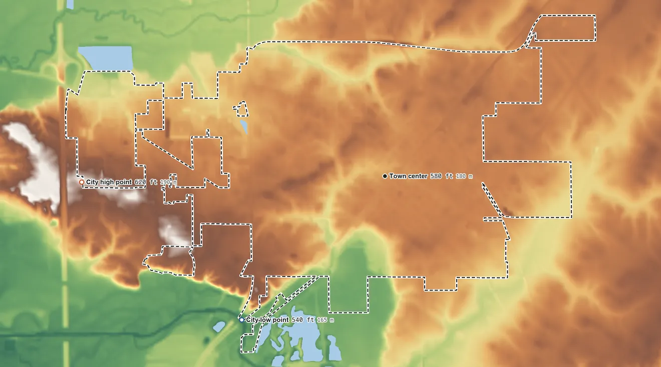Topographic elevation map of Lincoln, Illinois, shaded from 540 ft on the southwest side to 620 ft on the west side