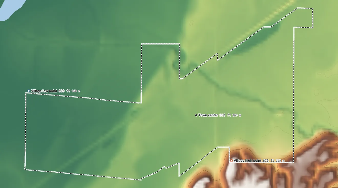 Topographic elevation map of Lomax, Illinois, shaded from 520 ft on the west side to 670 ft on the southeast side