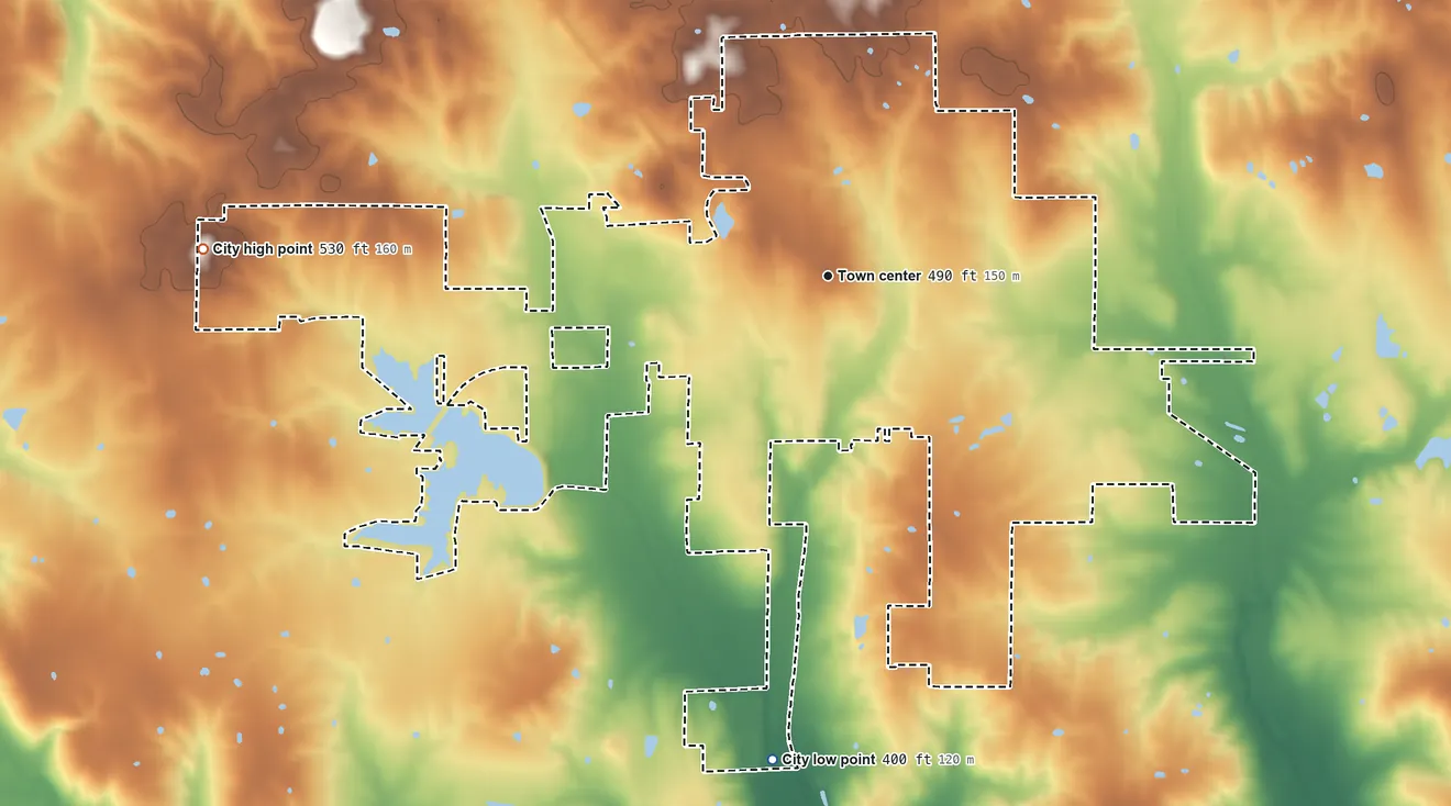 Topographic elevation map of McLeansboro, Illinois, shaded from 400 ft on the south side to 530 ft on the west side