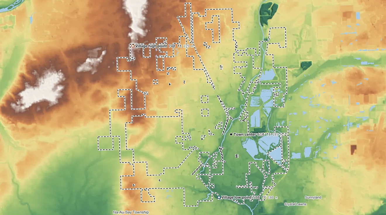 Topographic elevation map of Plainfield, Illinois, shaded from 580 ft on the south side to 740 ft on the northwest side