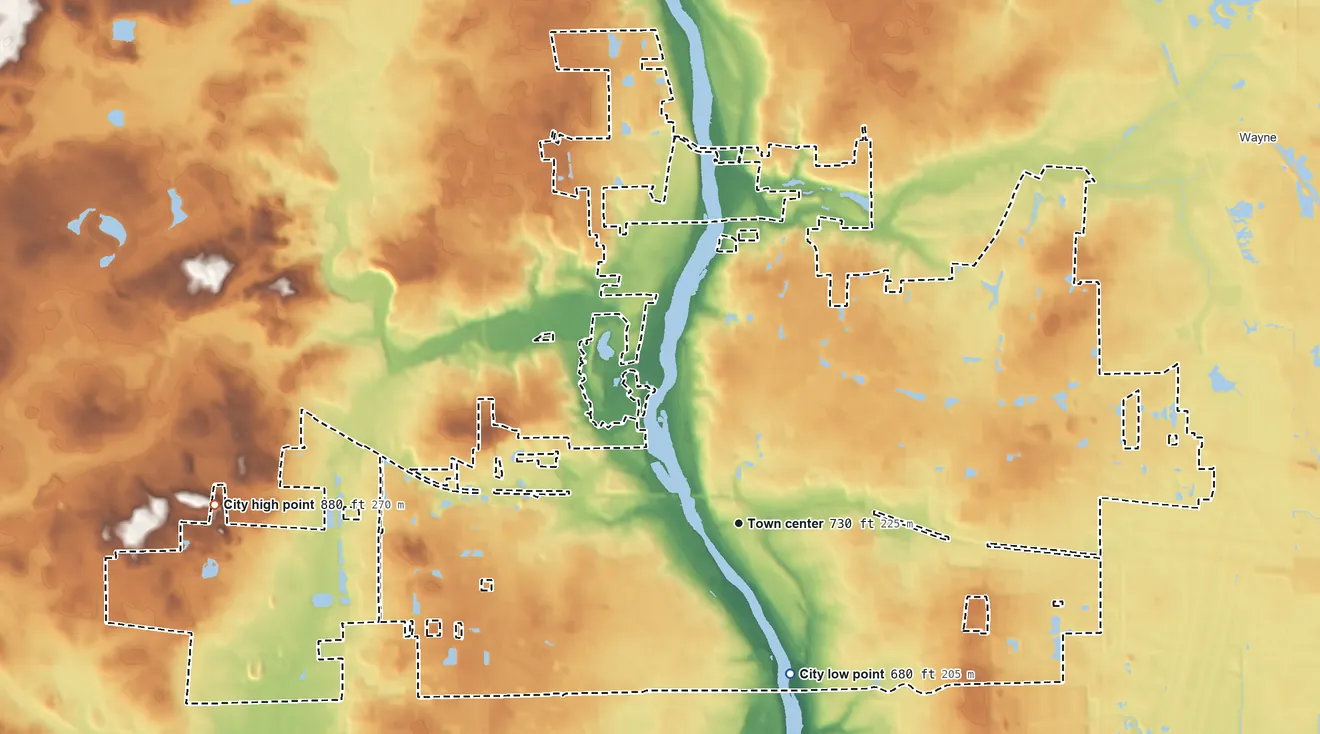 Topographic elevation map of St. Charles, Illinois, shaded from 680 ft on the south side to 880 ft on the west side