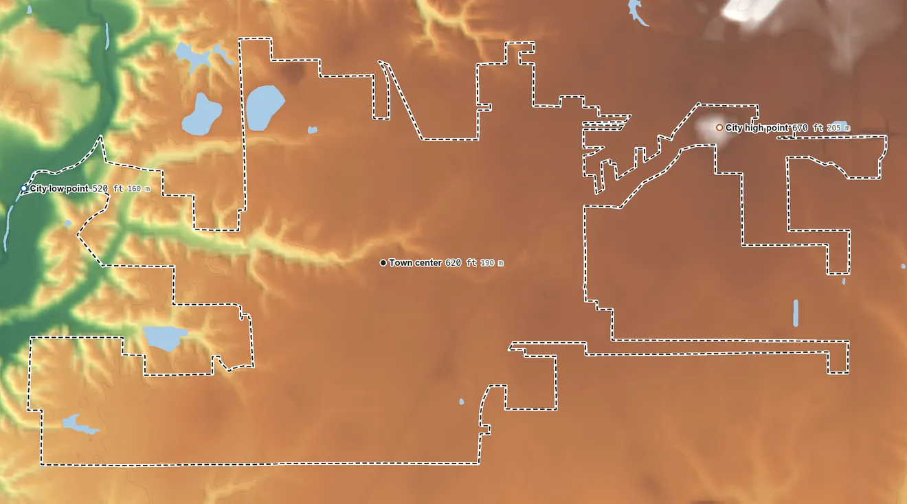 Topographic elevation map of Staunton, Illinois, shaded from 520 ft on the west side to 670 ft on the east side