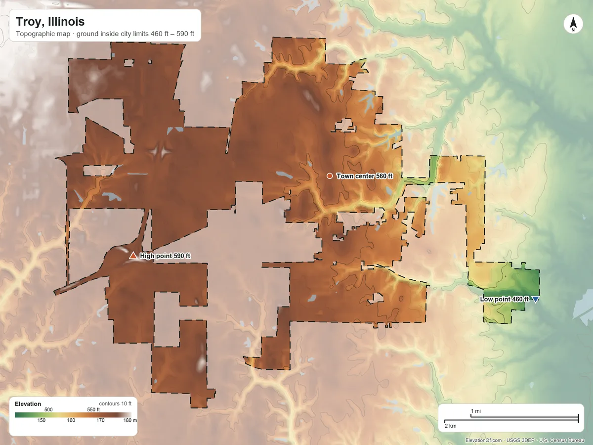 Topographic elevation map of Troy, Illinois, shaded from 460 ft on the southeast side to 590 ft on the west side