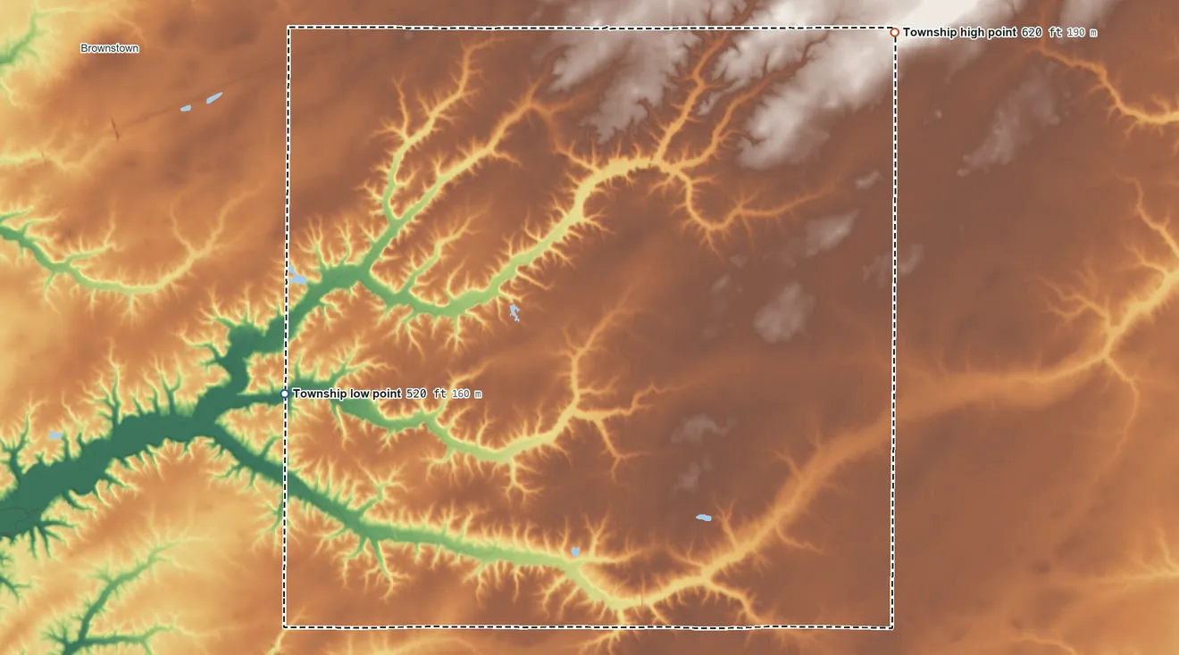 Topographic elevation map of Wheatland Township, Fayette County, Illinois, shaded from 520 ft on the southwest side to 620 ft on the northeast side