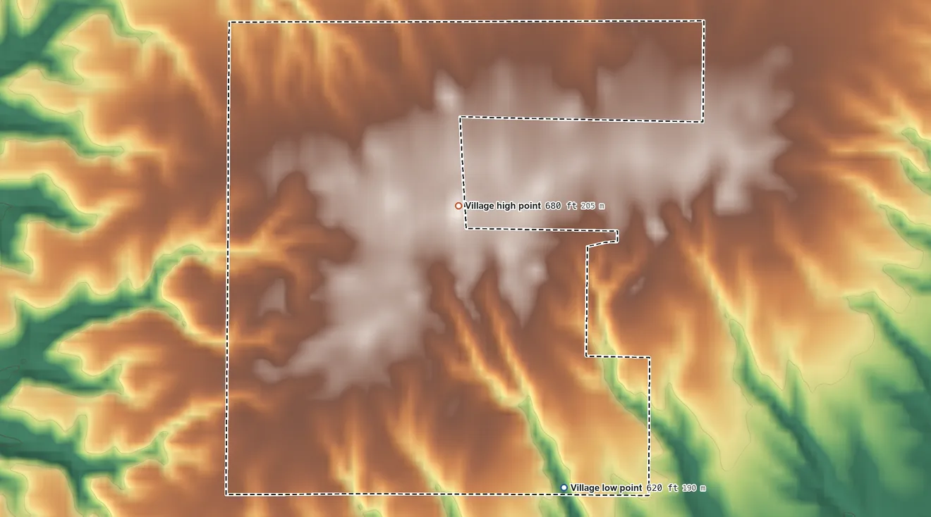 Topographic elevation map of Village of Wilmington, Illinois, shaded from 620 ft on the south side to 680 ft on the northwest side