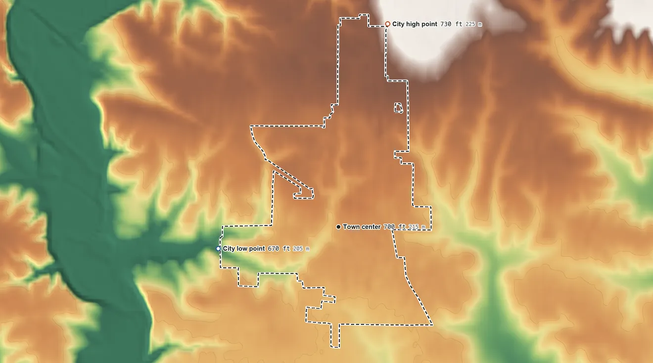 Topographic elevation map of Wyoming, Illinois, shaded from 670 ft on the west side to 730 ft on the north side