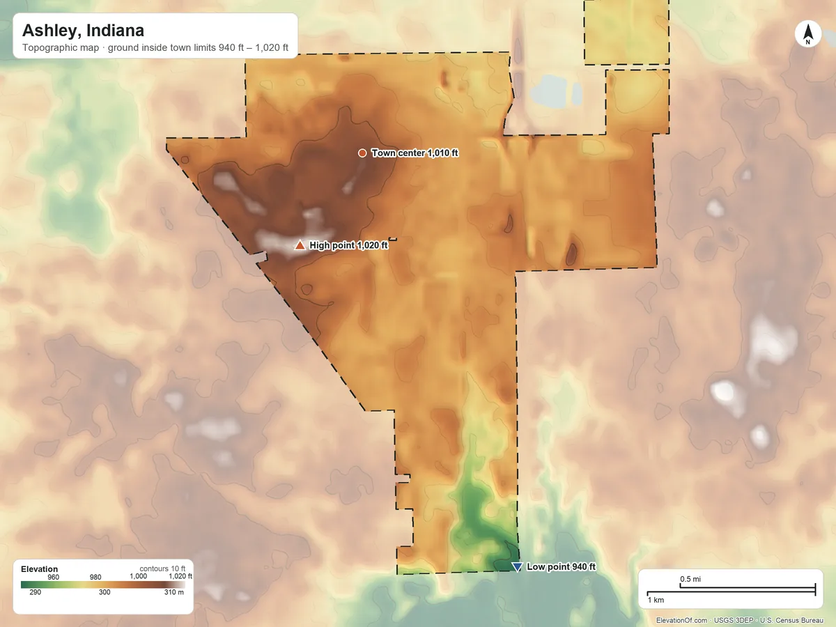 Topographic elevation map of Ashley, Indiana, shaded from 940 ft on the south side to 1,020 ft on the southwest side