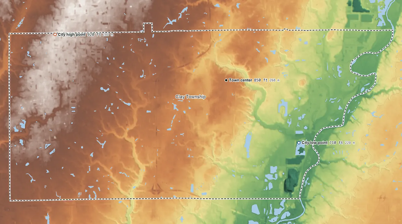 Topographic elevation map of Carmel, Indiana, shaded from 710 ft on the southeast side to 920 ft on the west side