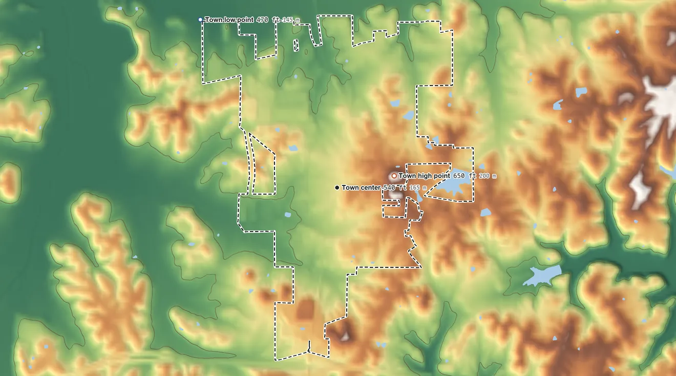 Topographic elevation map of Ferdinand, Indiana, shaded from 470 ft on the northwest side to 650 ft on the east side