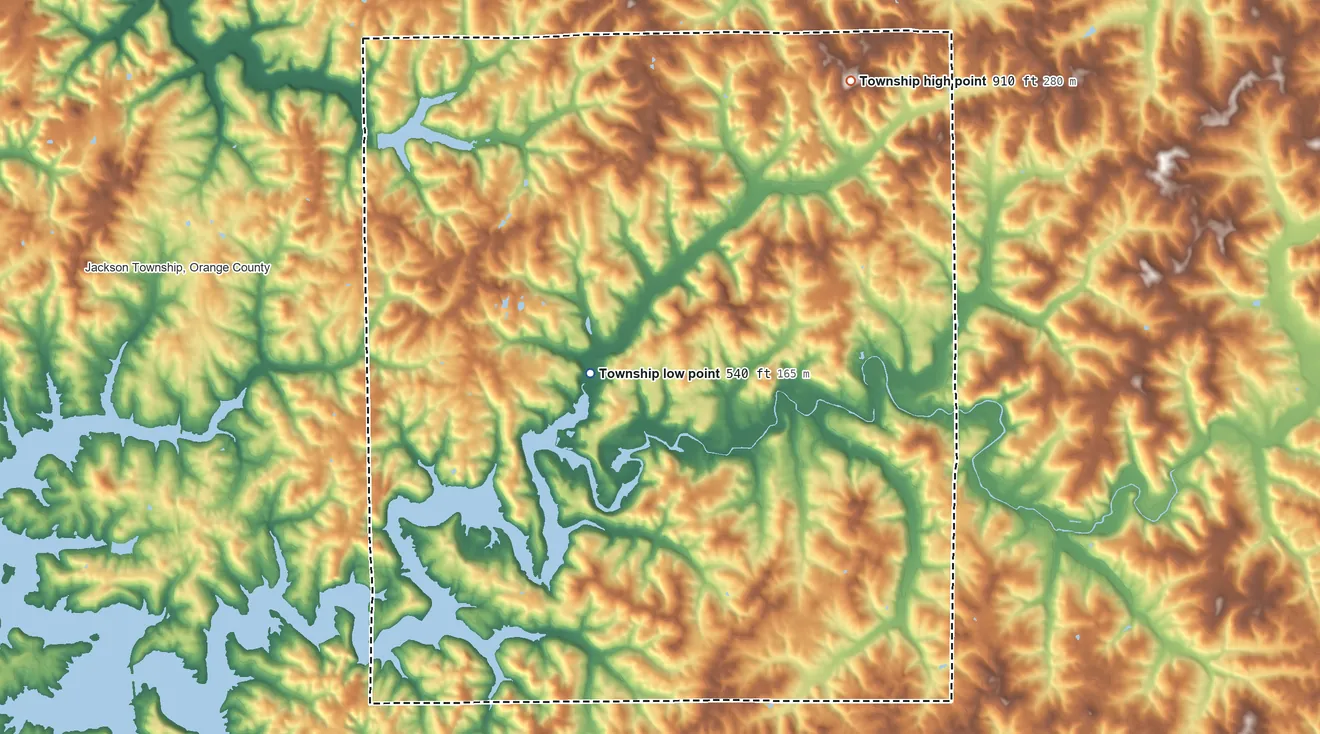 Topographic elevation map of Greenfield Township, Orange County, Indiana, shaded from 540 ft on the southwest side to 910 ft on the northeast side