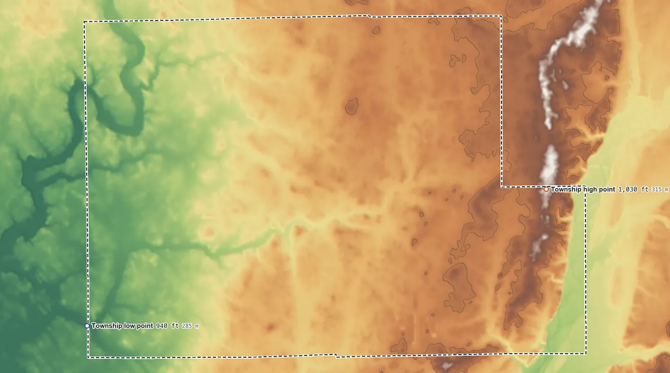 Topographic elevation map of Jackson Township, Rush County, Indiana, shaded from 940 ft on the southwest side to 1,030 ft on the east side